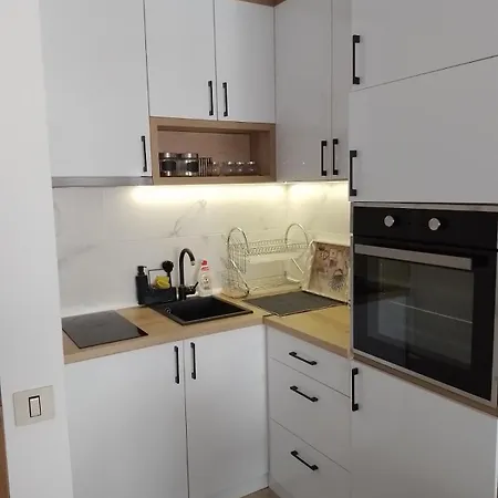 Four Seasons Apartamento